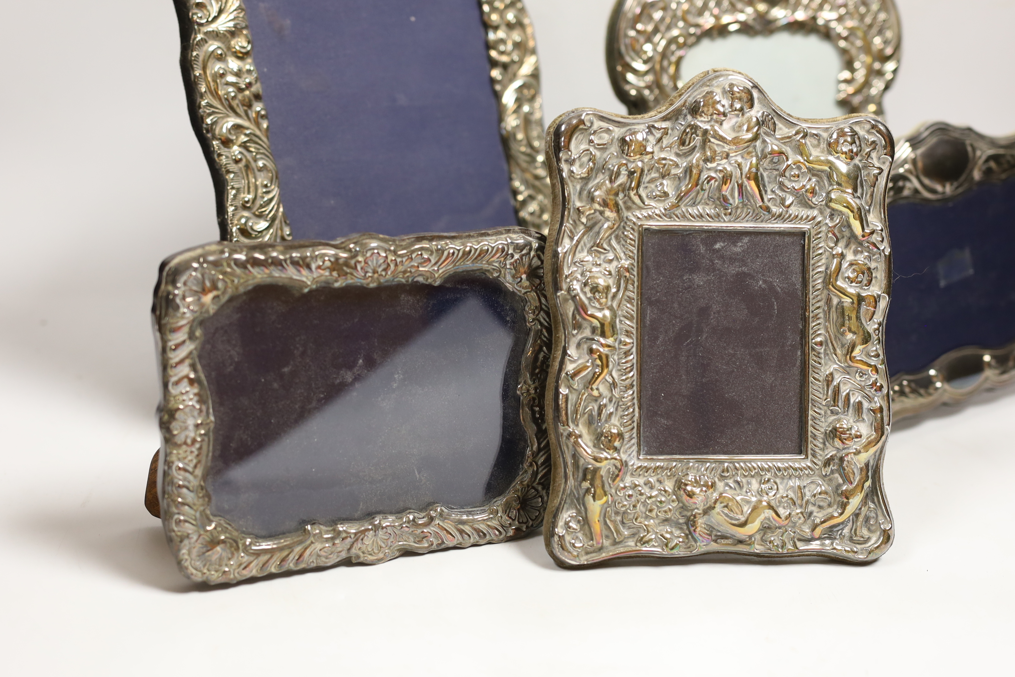 Five assorted modern silver mounted photograph frames, largest 27.5cm.